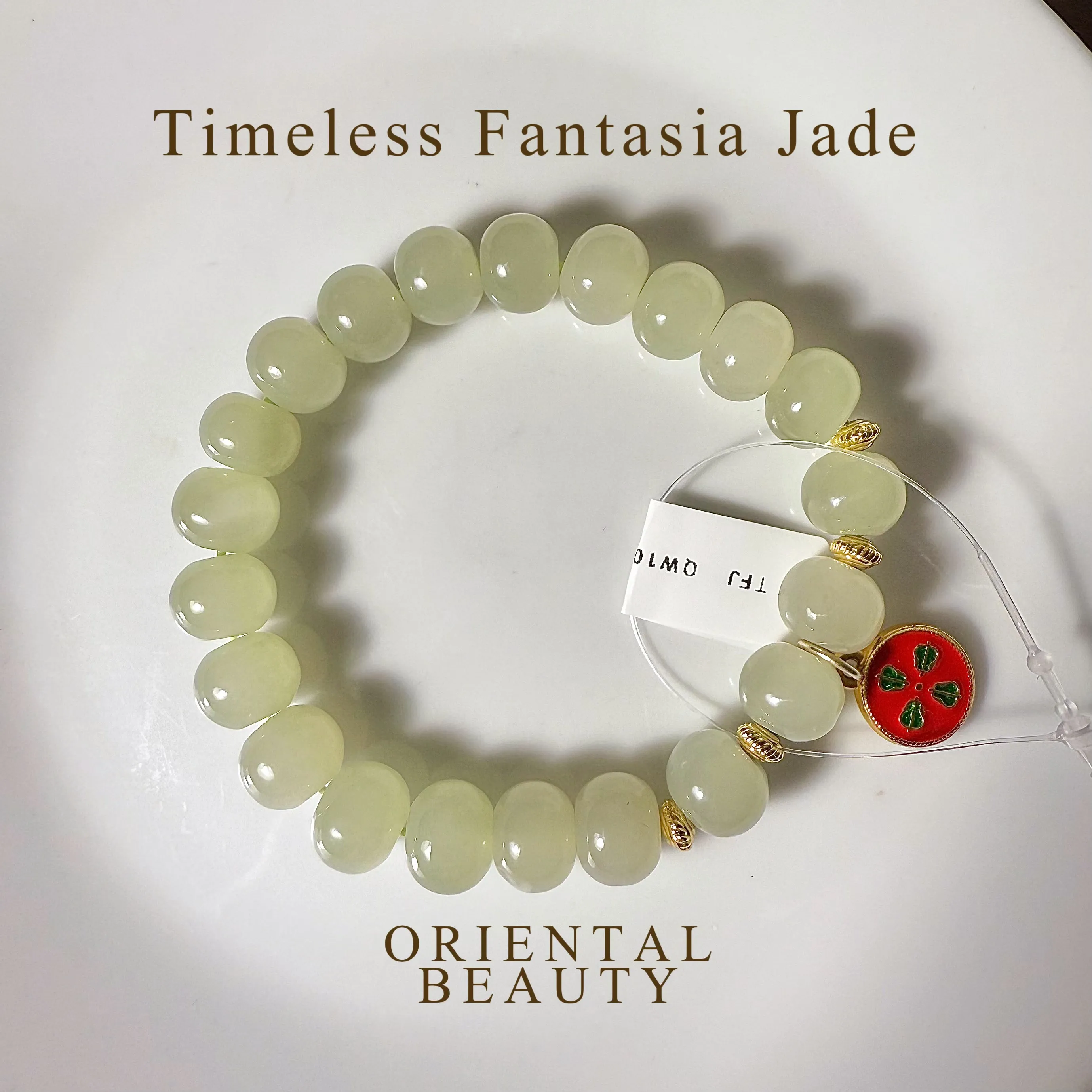 Certified genuine light water green Hetian Jade Bracelet - 10mm oval beads - 6.5 inch