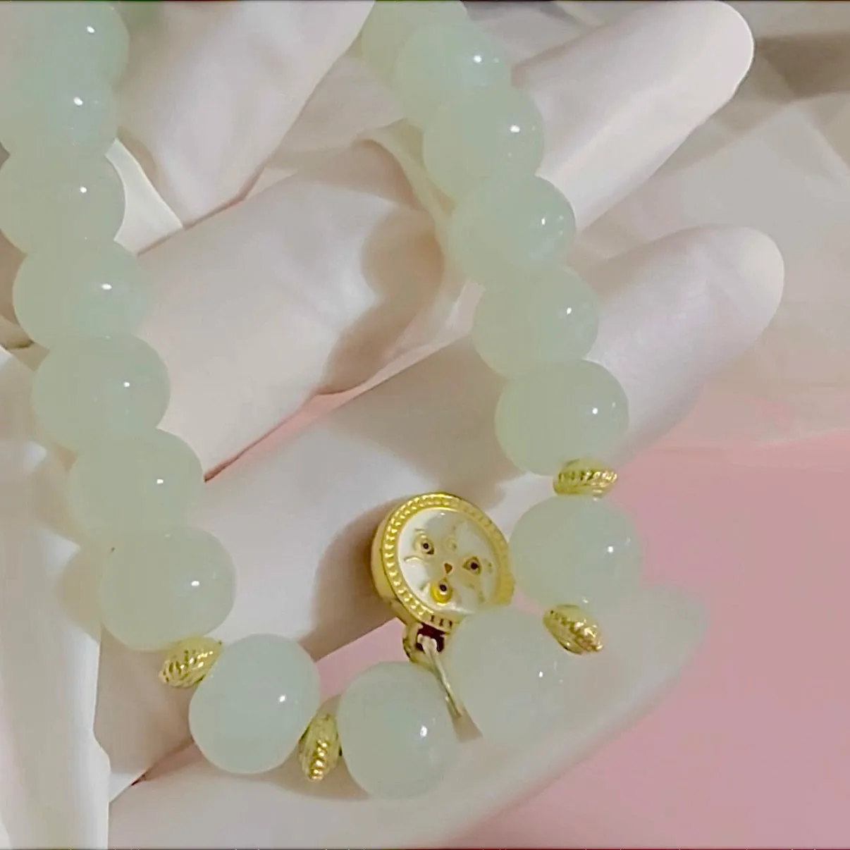 Certified genuine light water green Hetian Jade Bracelet - 10mm oval beads - 6.5 inch