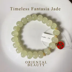 Certified genuine light water green Hetian Jade Bracelet - 10mm oval beads - 6.5 inch