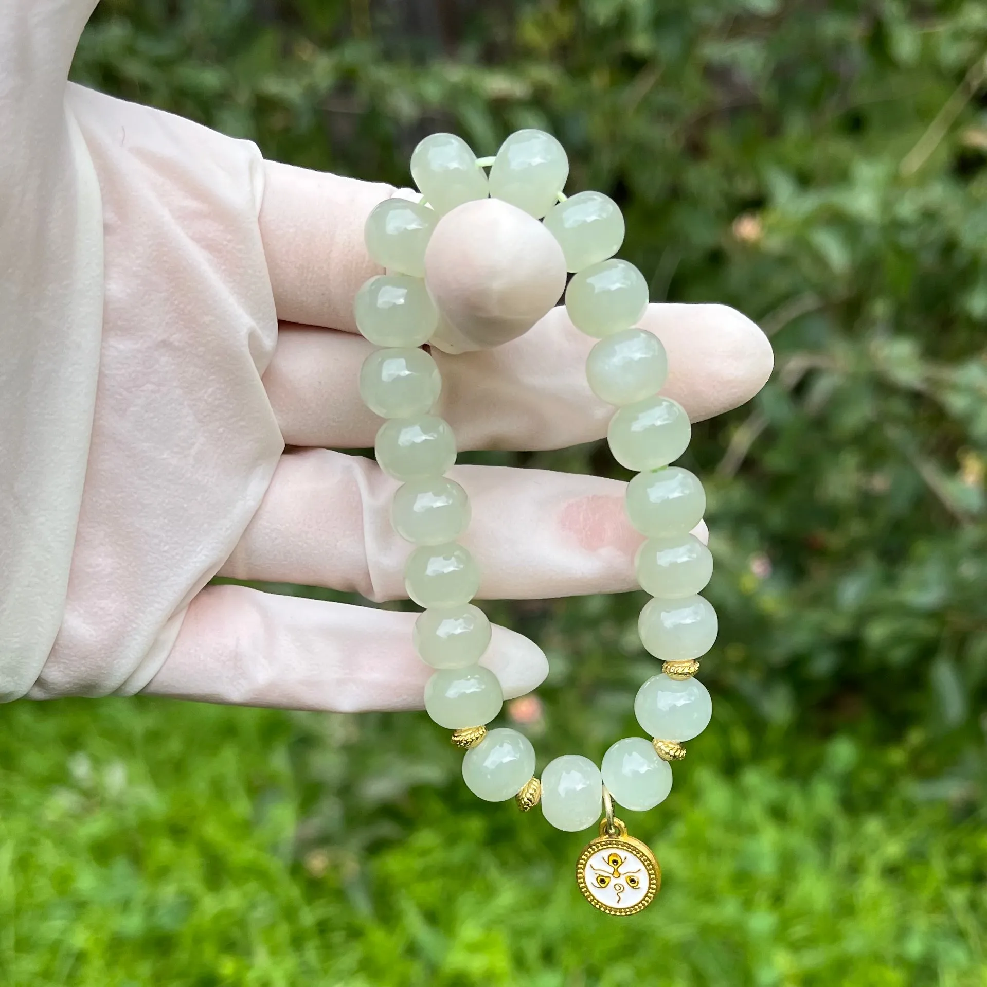 Certified genuine light water green Hetian Jade Bracelet - 10mm oval beads - 6.5 inch