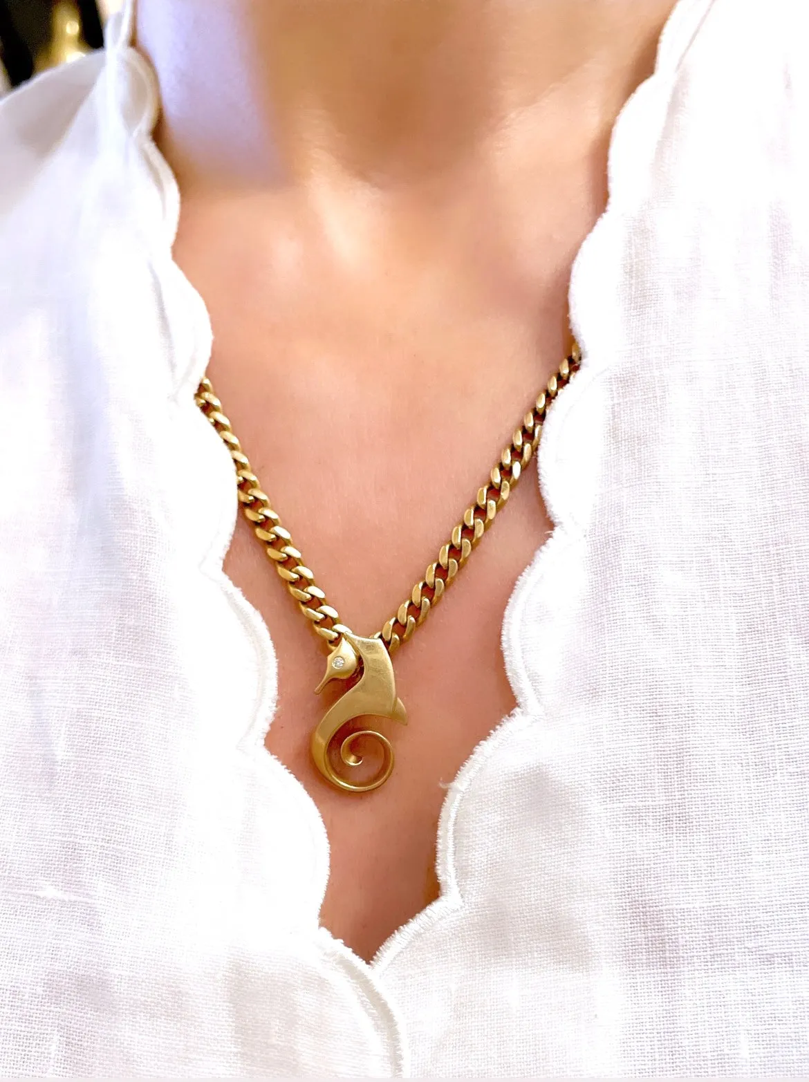 Vintage yellow 14K seahorse pendant with diamond